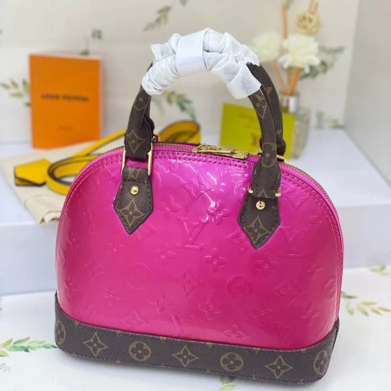 Louis Vuitton Alma Handbag