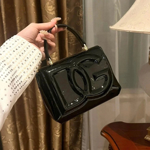 D&G logo-embossed leather bag