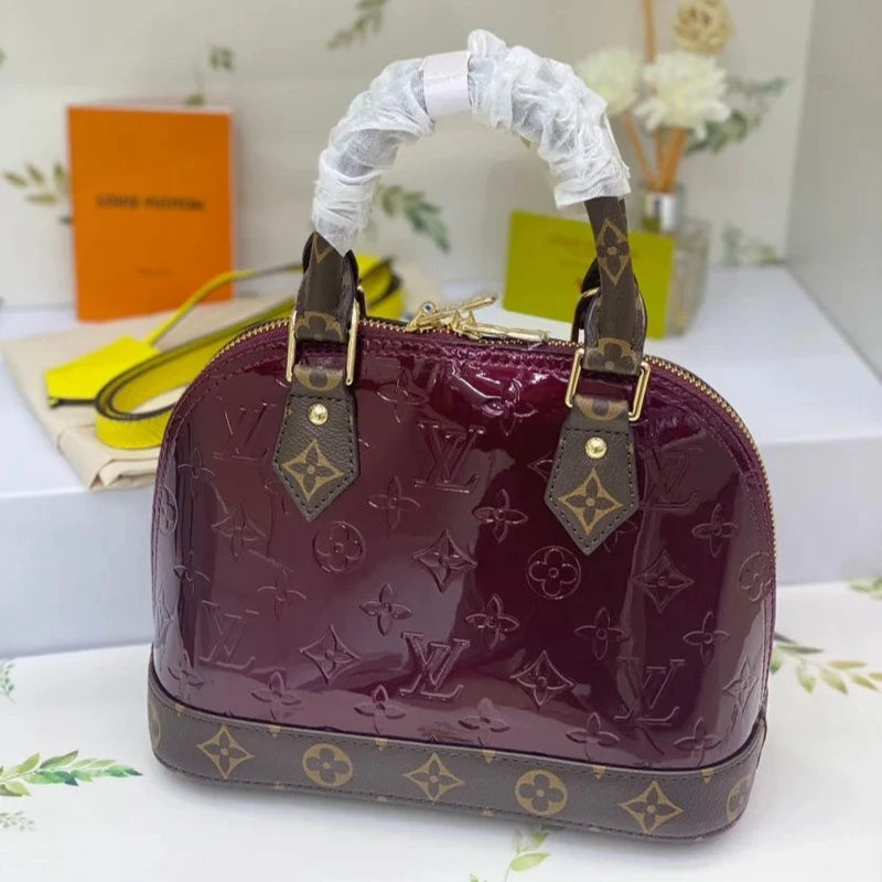 Louis Vuitton Alma Handbag